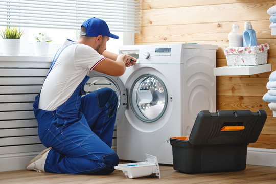 Washing machine being repaired